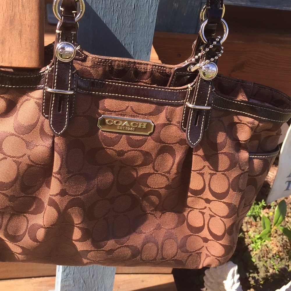Coach pocket book